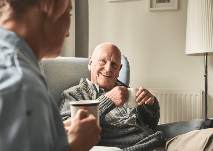 2 person with coffee mug