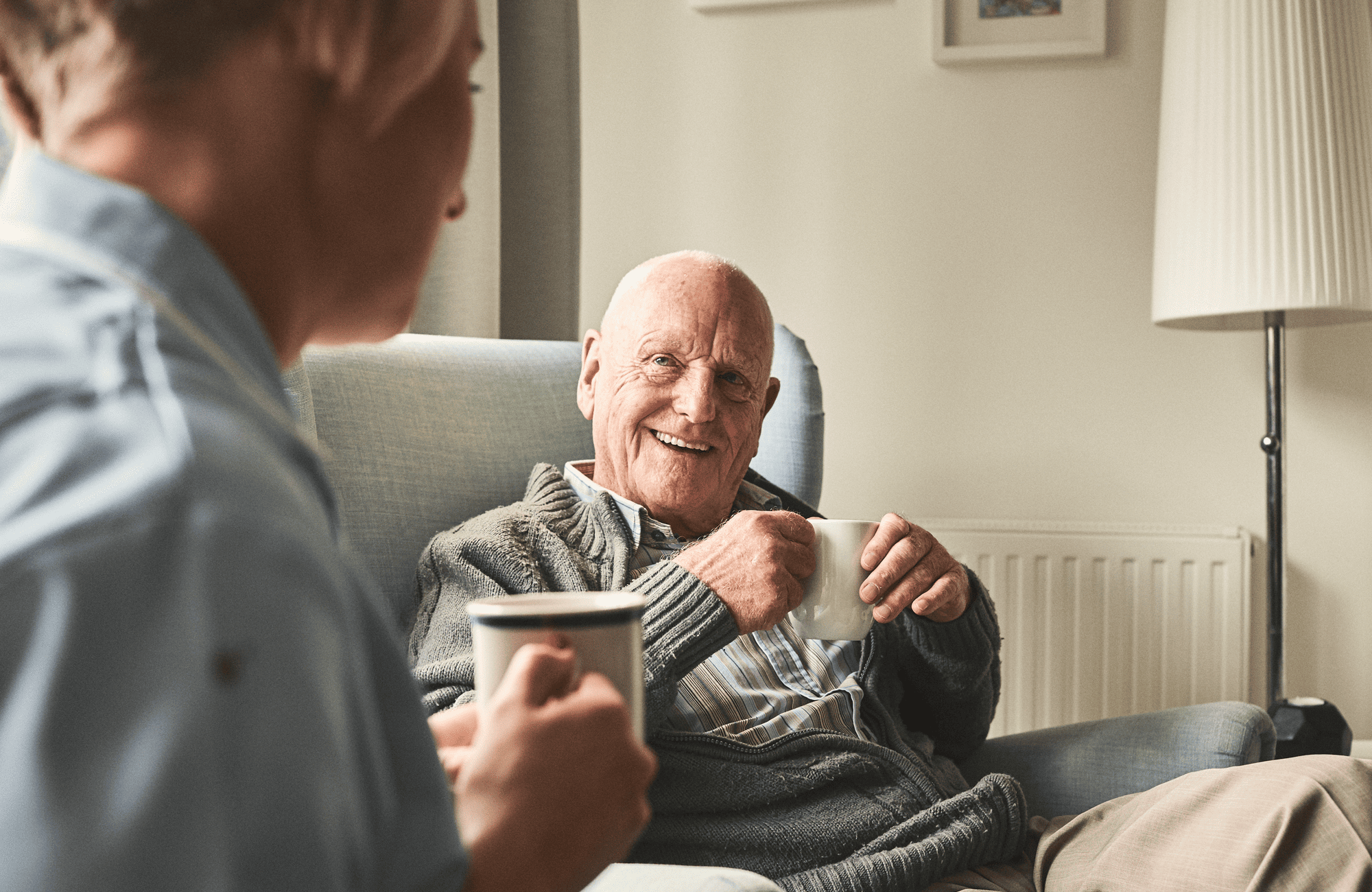 2 person with coffee mug